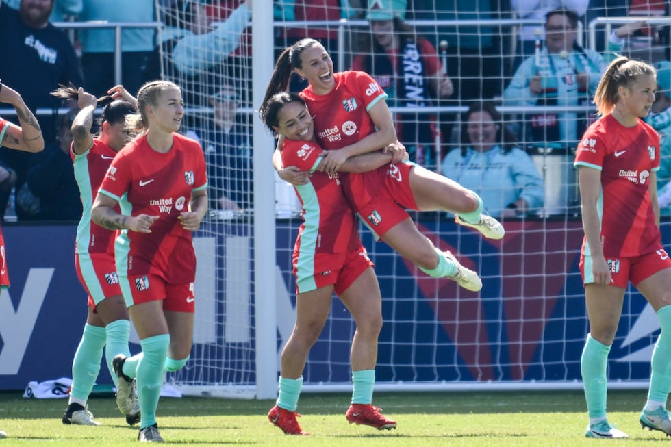 Kansas City Current midfielder Lo'eau LaBonta picks up Kansas City Current midfielder Vanessa...