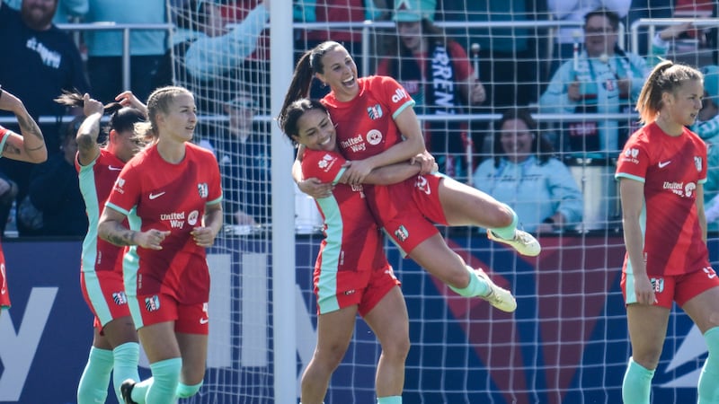 Kansas City Current midfielder Lo'eau LaBonta picks up Kansas City Current midfielder Vanessa...