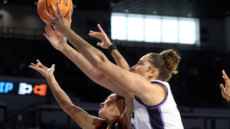 Kansas State's Ayoka Lee, right, and Fairfield's Emina Selimovic (23) battle for a rebound in...