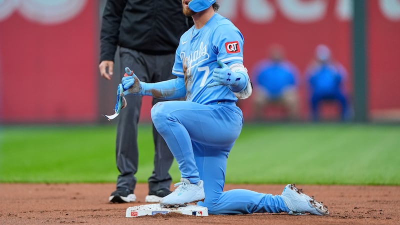 FILE - Kansas City Royals' Bobby Witt Jr. celebrates on second after hitting a double during...
