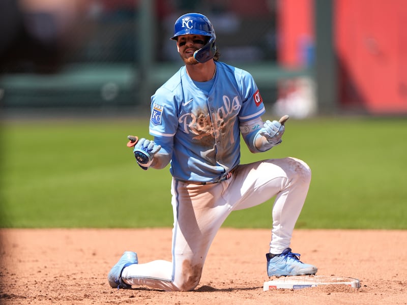 Kansas City Royals' Bobby Witt Jr. celebrates on second after hitting an RBI double during the...