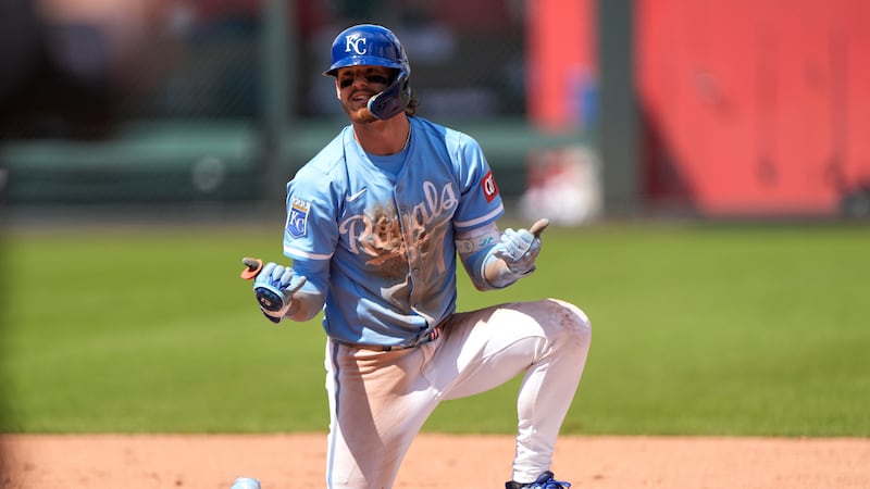 Kansas City Royals' Bobby Witt Jr. celebrates on second after hitting an RBI double during the...