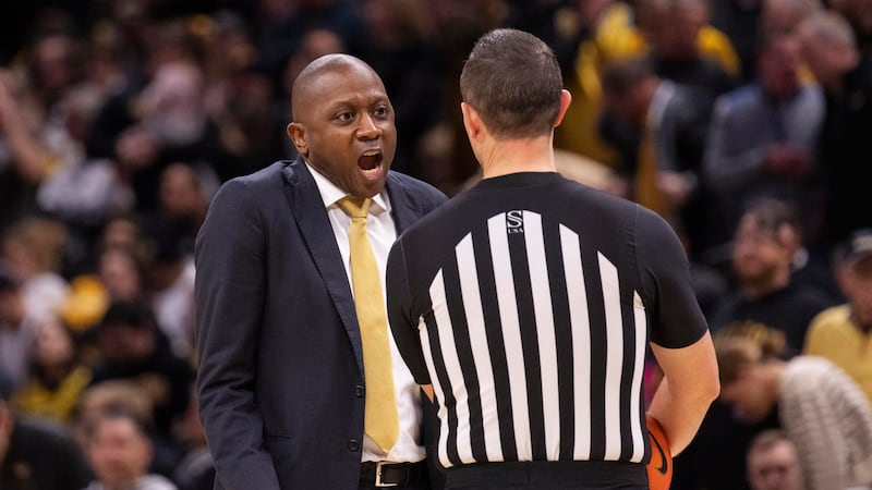 FILE: Missouri head coach Dennis Gates, left, argues a call with the referee, right, during...