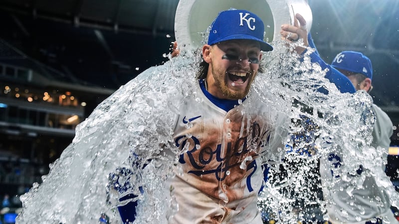 Kansas City Royals' Bobby Witt Jr. is doused by teammates after a baseball game against the...