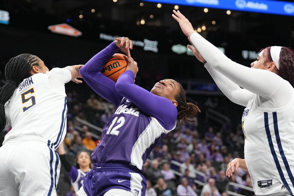 The K-State Wildcats and West Virginia Mountaineers compete during the Phillips 66 Big 12...