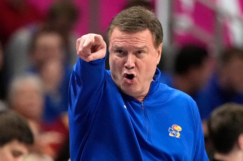 Kansas head coach Bill Self is seen on the sidelines during the first half of an NCAA college...