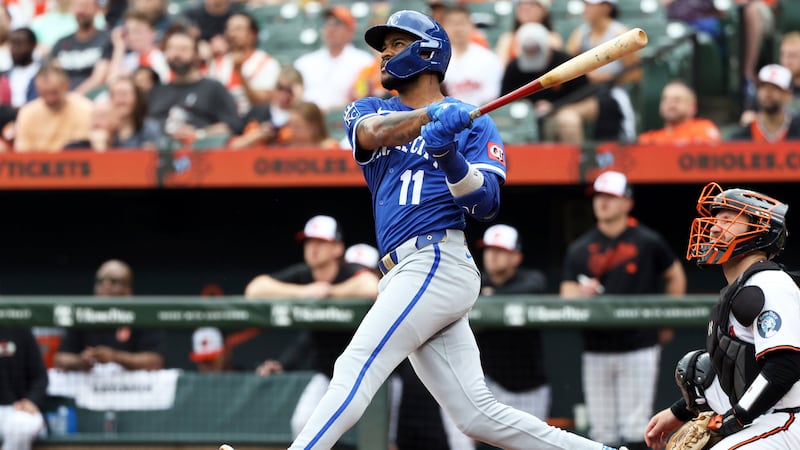 Kansas City Royals' Maikel Garcia hits a home run during the second inning of a baseball game...