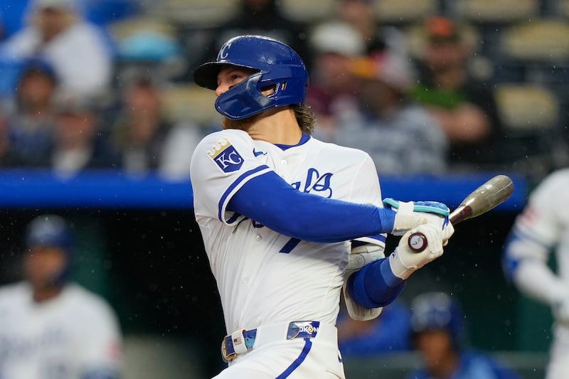 Kansas City Royals' Bobby Witt Jr. watches his two-run home run during the fifth inning of a...