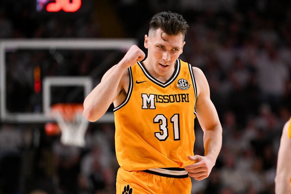 Missouri guard Caleb Grill (31) reacts after sinking a 3-point basket against Vanderbilt...