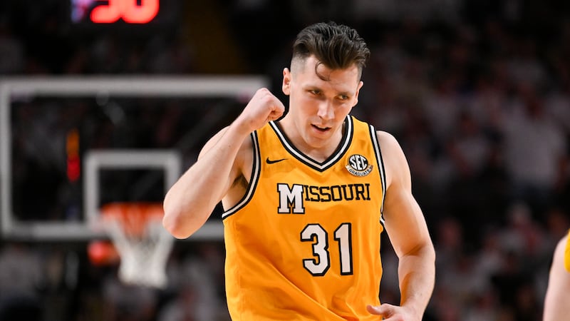 Missouri guard Caleb Grill (31) reacts after sinking a 3-point basket against Vanderbilt...