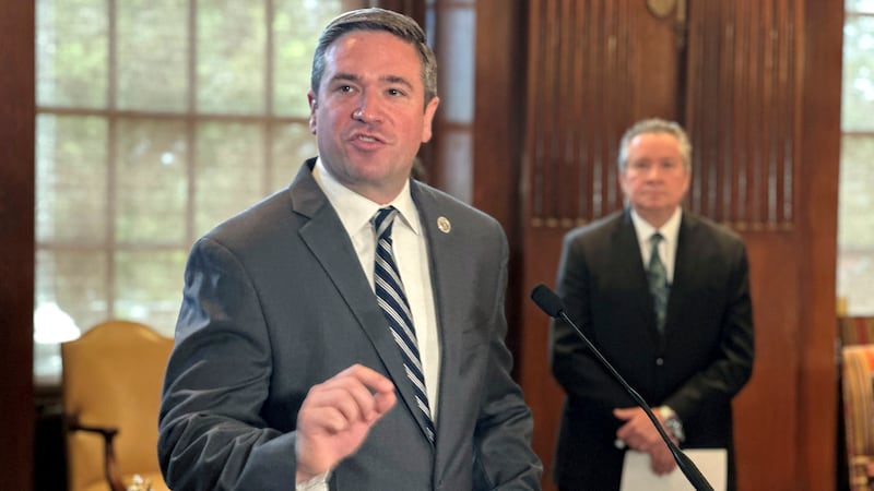 FILE: Missouri Attorney General Andrew Bailey speaks to reporters, Thursday, Aug. 1, 2024, at...