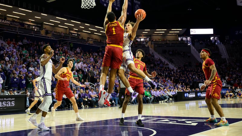 Iowa State center Dishon Jackson (1) defends against a driving Kansas State guard Max Jones,...