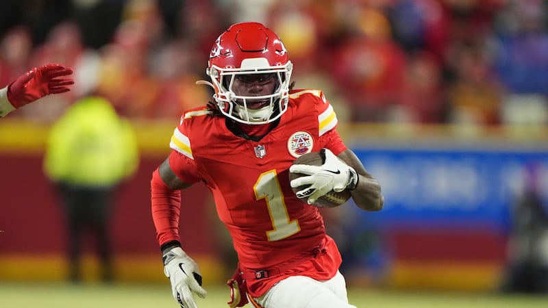Kansas City Chiefs wide receiver Xavier Worthy (1) runs with the ball during the first half of...