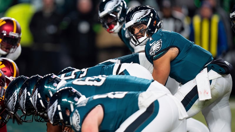 FILE - Philadelphia Eagles quarterback Jalen Hurts (1) lines up for the goal line Tush Push...