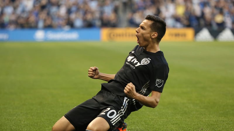 KANSAS CITY, KS - MAY 05: Sporting Kansas City forward Daniel Salloi (20) celebrates after a...