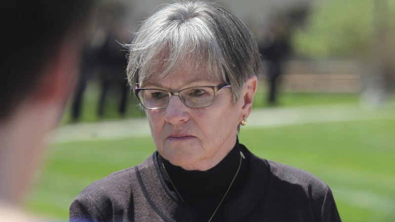 Kansas Gov. Laura Kelly participates in a ceremony honoring law enforcement officers killed on...
