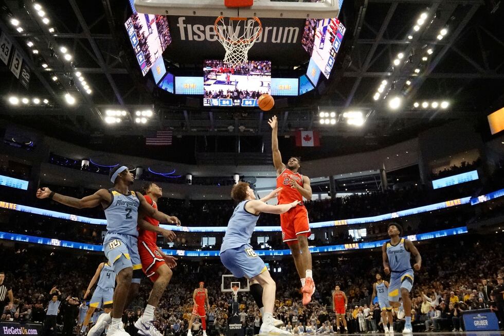 St. John's's Zuby Ejiofor makes the game-winning shot in overtime of an NCAA college...