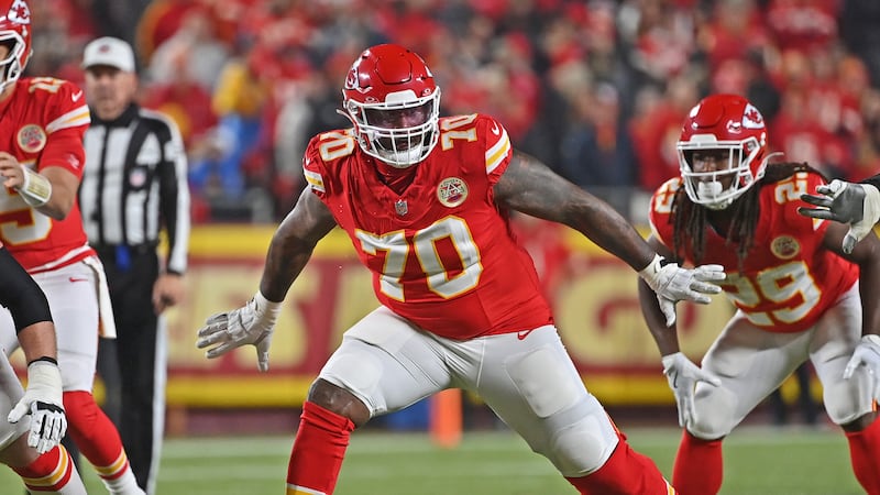 Kansas City Chiefs offensive tackle D.J. Humphries (70) gets set to block during an NFL...