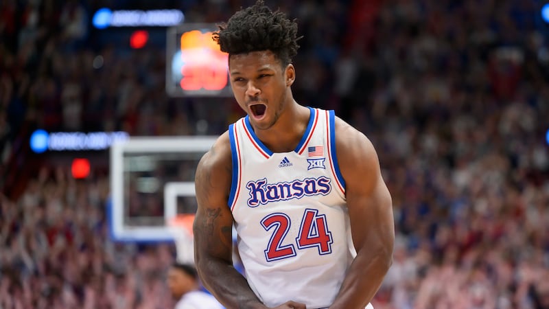 Kansas forward KJ Adams Jr. celebrates a basket against Texas Tech during the first half of an...