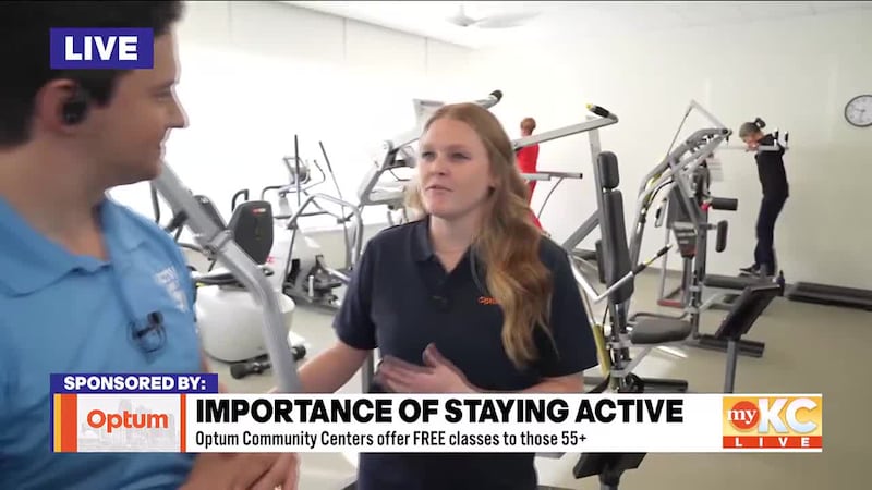 Taylor Garner, Community Center Site Coordinator at Optum, walks Shane through a weight...