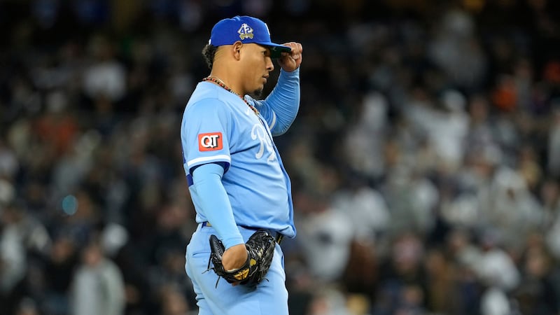 Kansas City Royals pitcher Angel Zerpa reacts after walking New York Yankees' Austin Wells to...
