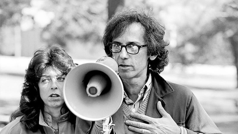Christo and Jeanne-Claude directing work at the Wrapped Walk Ways project. Kansas City, 1978....