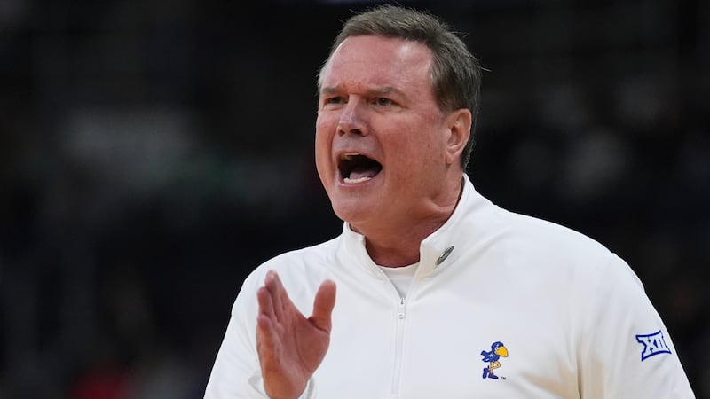 Kansas head coach Bill Self calls to his players during the first half in the first round of...