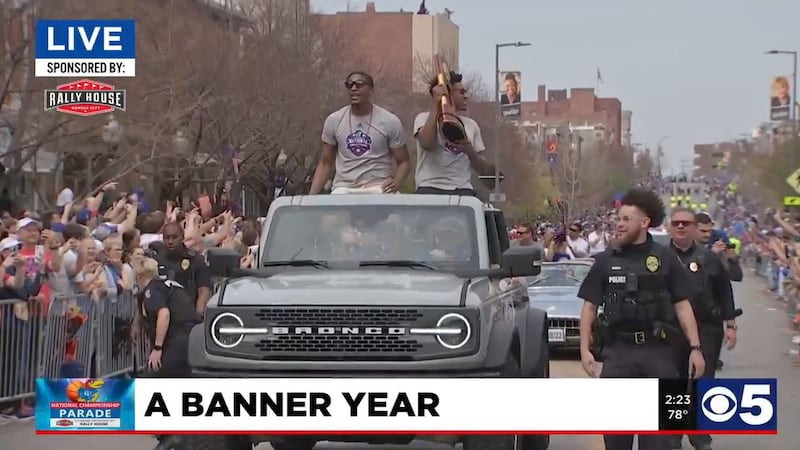 Thousands joined the Kansas Jayhawks men's basketball team for a celebratory parade in...