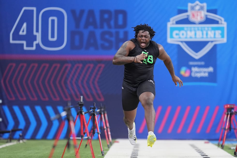Missouri offensive lineman Armand Membou runs the 40-yard dash at the NFL football scouting...