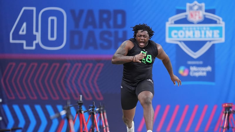 Missouri offensive lineman Armand Membou runs the 40-yard dash at the NFL football scouting...