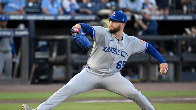 Kansas City Royals pitcher Noah Cameron throws during the first inning of a baseball game...