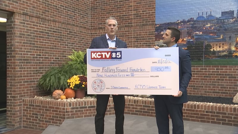 The First Warn 5 Weather team raised $950 for the month of September to benefit the Falling...