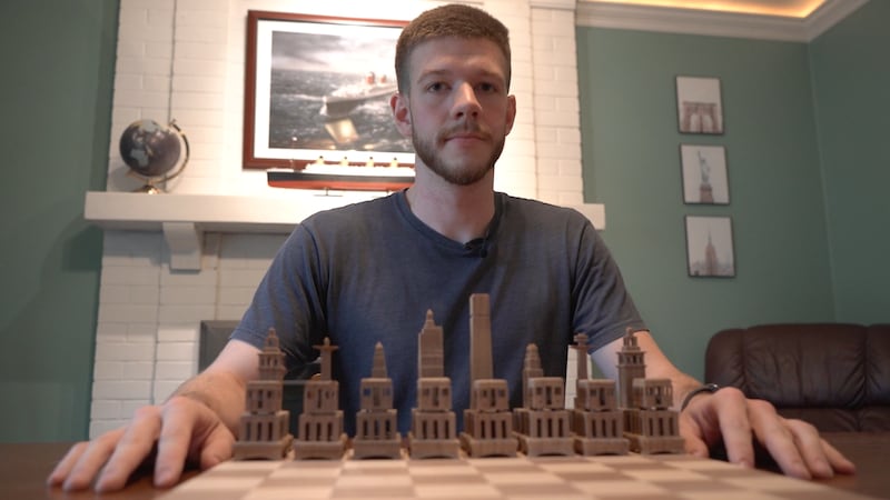 David Pentimone carved a chess set featuring the Kansas City skyline and landmark buildings.