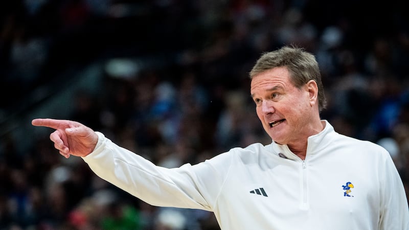 Kansas head coach Bill Self calls out to his players during the first half of a second-round...