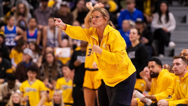 Missouri head coach Robin Pingeton calls a play during the first half of an NCAA college...