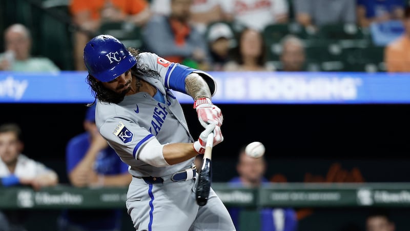 Kansas City Royals' Jonathan India hits a double off Baltimore Orioles pitcher Tomoyuki Sugano...