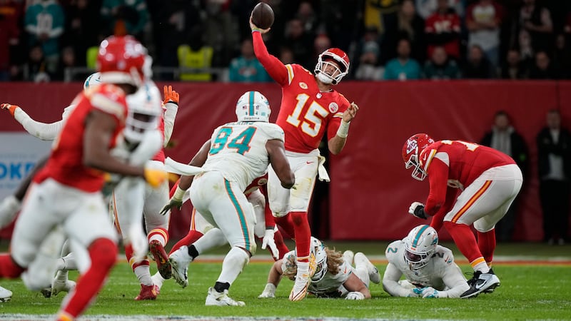Kansas City Chiefs quarterback Patrick Mahomes (15) throws during the second half of an NFL...