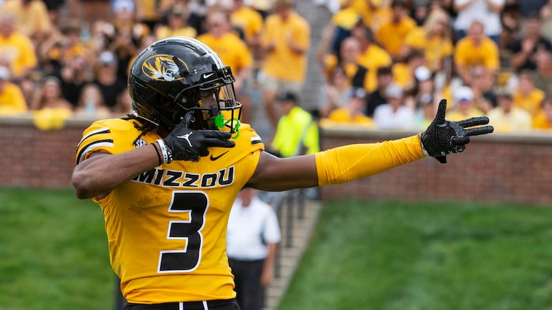 Missouri wide receiver Luther Burden III celebrates a first down during the second half of an...