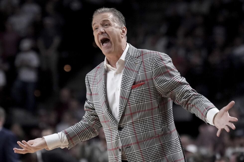 Arkansas head coach John Calipari argues a call against his defense during the 1st half of a...