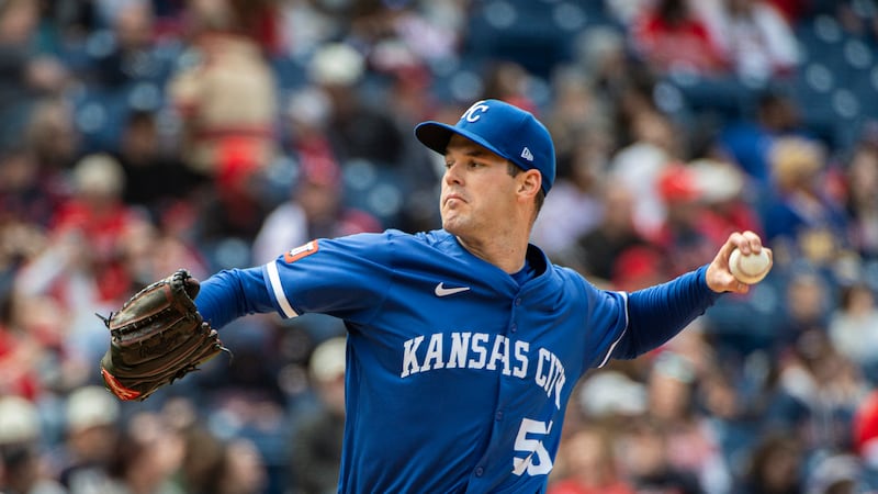 Kansas City Royals starting pitcher Cole Ragans delivers against the Cleveland Guardians...