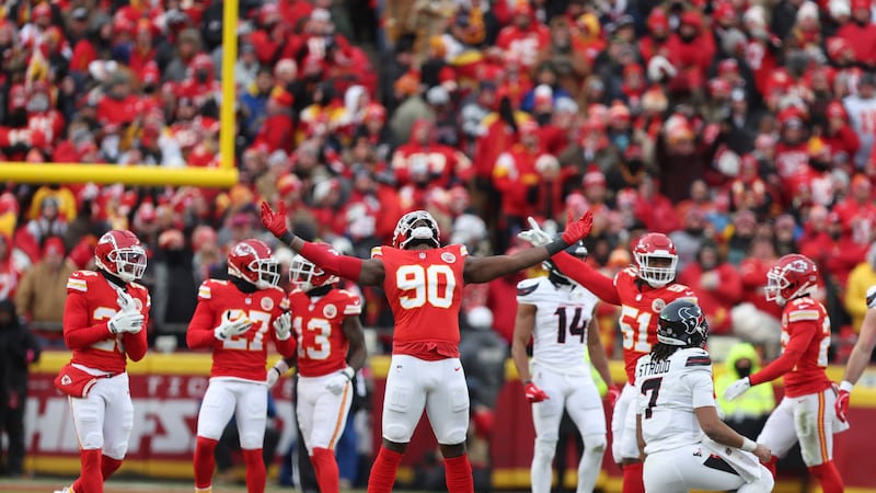 Kansas City Chiefs defensive end Charles Omenihu (90) celebrates after forcing a fumble by...