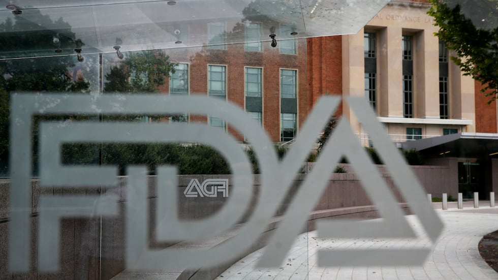 This Aug. 2, 2018, file photo shows the U.S. Food and Drug Administration building behind FDA...