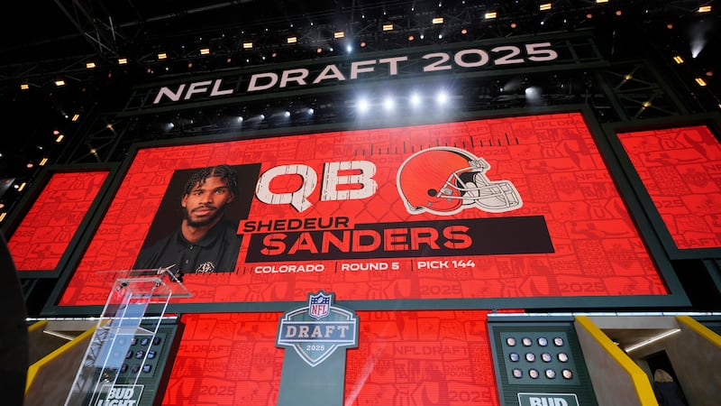 FILE - A screen shows Colorado quarterback Shedeur Sanders after being chosen by the Cleveland...