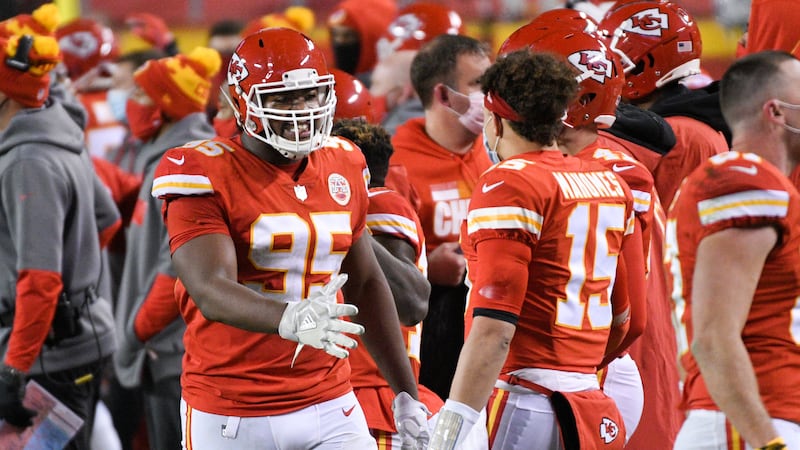 Kansas City Chiefs defensive tackle Chris Jones (95) congratulates Kansas City Chiefs...