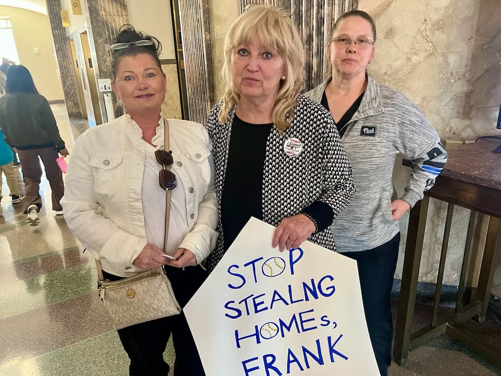 A group of people who staged rallies at both Jackson County Courthouse locations celebrated as...