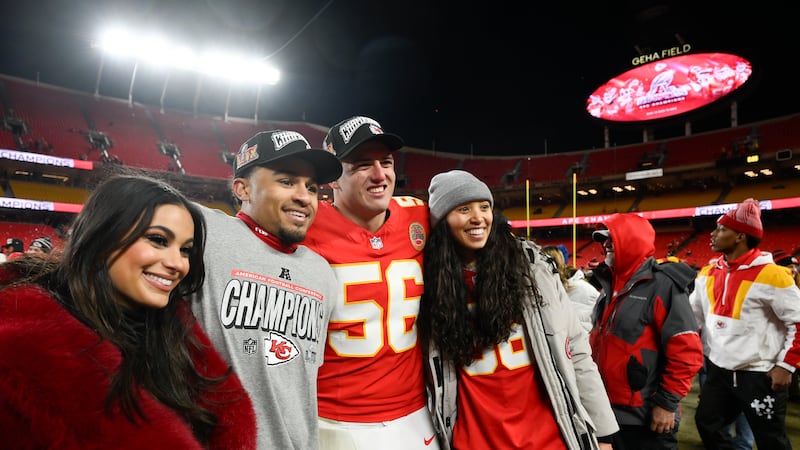 Kansas City Chiefs cornerback Trent McDuffie, second from left, and Chiefs defensive end...