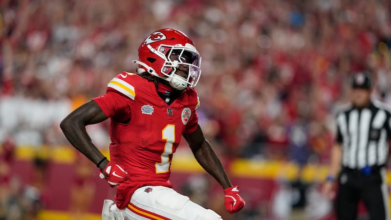 Kansas City Chiefs wide receiver Xavier Worthy (1) celebrates after scoring during the first...