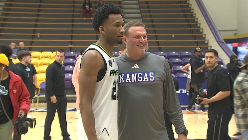 Bill Self poses with Darryn Peterson at Haskell Indian Nations University.